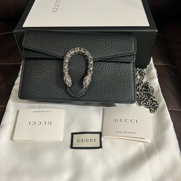 Gucci Handbags - Gucci Black Leather Clutch with Silver Chain